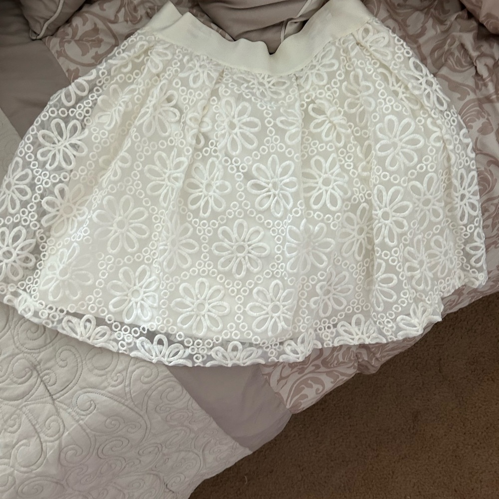 White floral mini skirt from Bebe